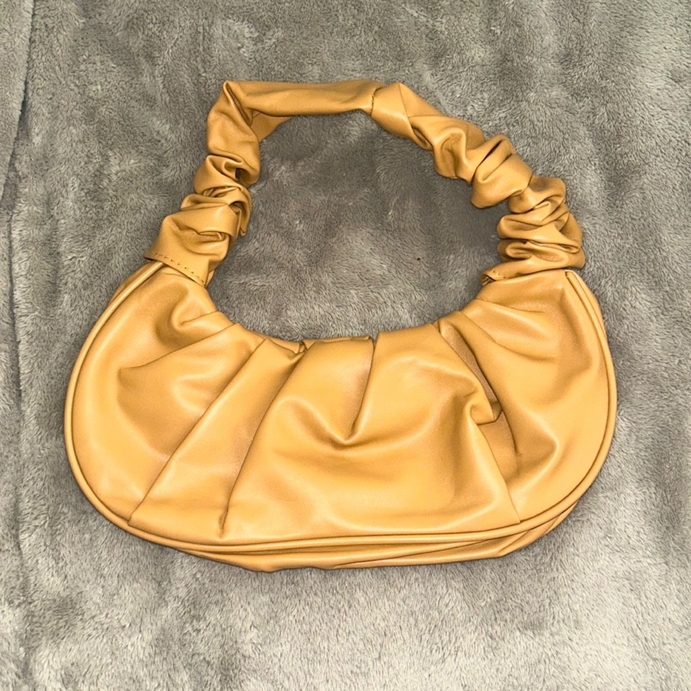 Small purse. Never worn before.